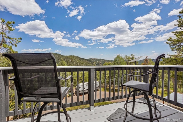150 Cedar Rd, Evergreen, CO 80439 - wooden deck with a mountain view