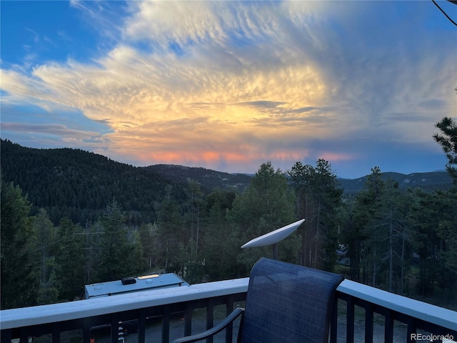 150 Cedar Rd, Evergreen, CO 80439 - view of mountain backdrop with a forest