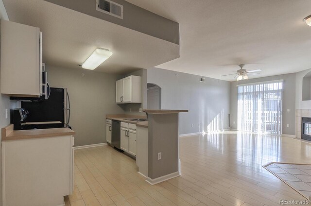 7440 S Blackhawk St Unit 12-204, Englewood, CO 80112 - kitchen with open floor plan, stainless steel appliances, baseboards, and a sink