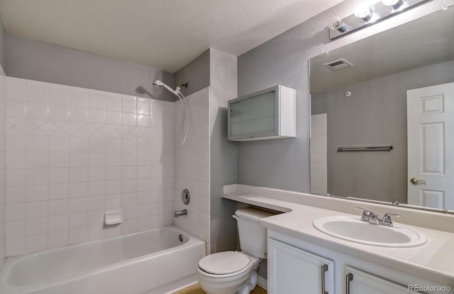 7440 S Blackhawk St Unit 12-204, Englewood, CO 80112 - bathroom with toilet, vanity, and shower / bathtub combination