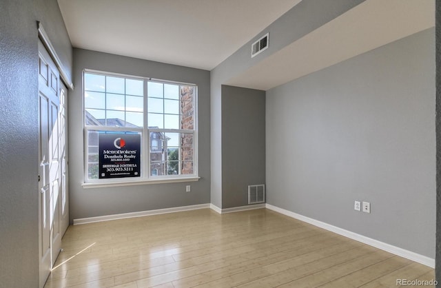 7440 S Blackhawk St Unit 12-204, Englewood, CO 80112 - spare room with wood finished floors and baseboards