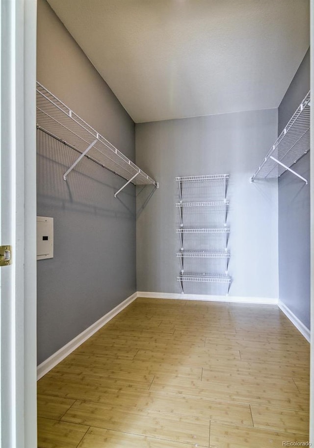 7440 S Blackhawk St Unit 12-204, Englewood, CO 80112 - walk in closet featuring wood finished floors