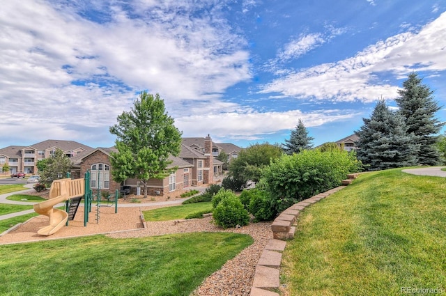 7440 S Blackhawk St Unit 12-204, Englewood, CO 80112 - view of grassy yard with a residential view