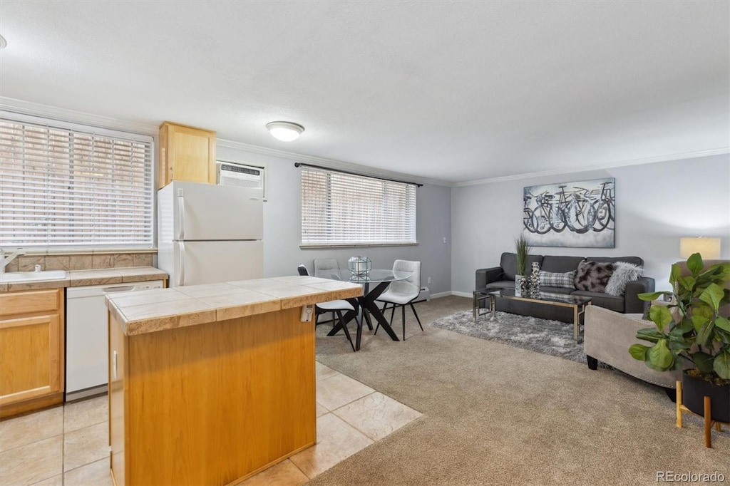 1260 N Humboldt St Unit 1, Denver, CO 80218 - kitchen with white appliances, tile countertops, light tile patterned floors, and light carpet
