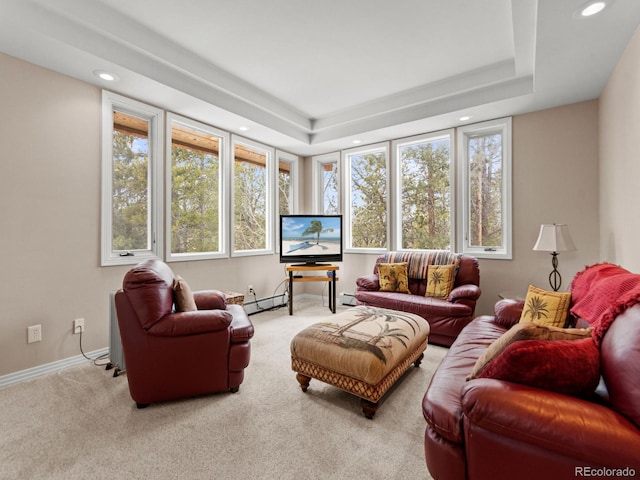 sunroom featuring a baseboard heating unit