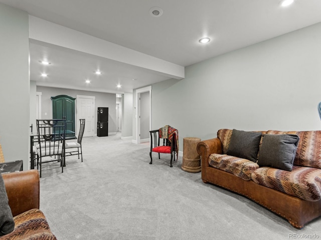 living room with light colored carpet