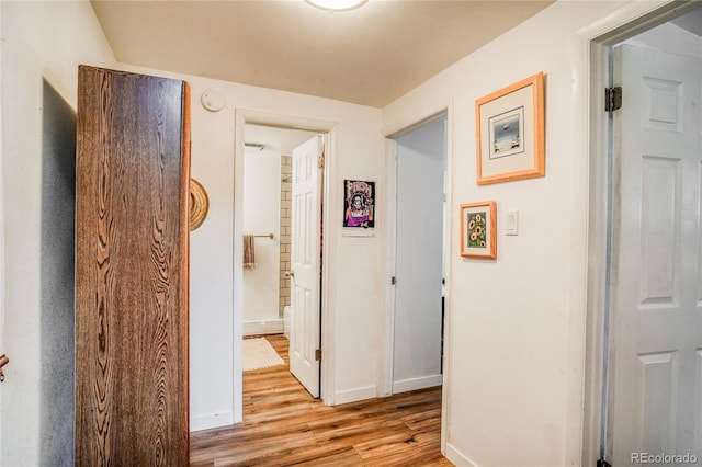 1842 Canyon Blvd Unit 105, Boulder, CO 80302 - hall featuring light wood-style floors and baseboards
