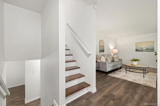 5193 Zinnia St, Arvada, CO 80002 - staircase featuring wood finished floors and arched walkways
