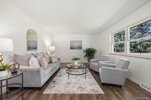 5193 Zinnia St, Arvada, CO 80002 - living area featuring dark wood-style floors and baseboards