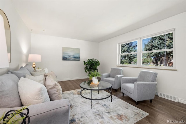 5193 Zinnia St, Arvada, CO 80002 - living room with dark wood-style flooring and baseboards