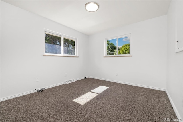 5193 Zinnia St, Arvada, CO 80002 - empty room with dark colored carpet