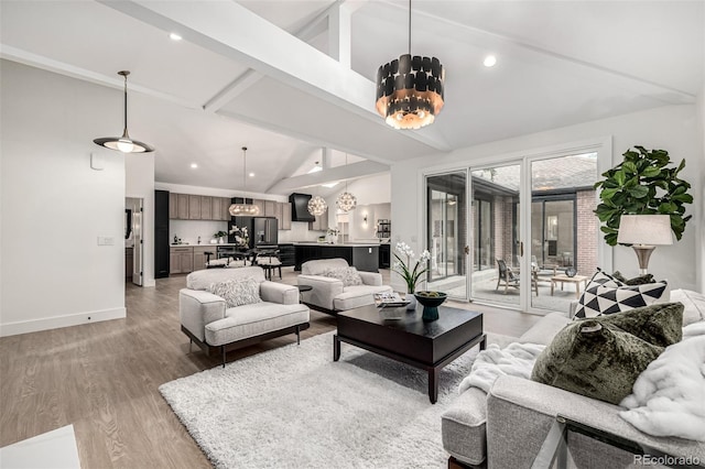 5401 E Dakota Ave Unit 22, Denver, CO 80246 - living area with a chandelier, beamed ceiling, light wood finished floors, high vaulted ceiling, and recessed lighting