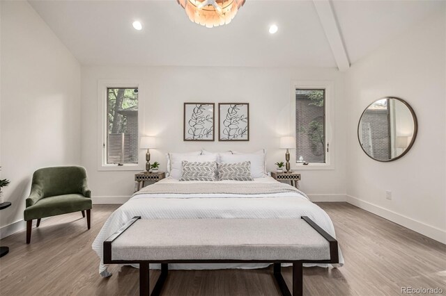 5401 E Dakota Ave Unit 22, Denver, CO 80246 - bedroom with light wood-style floors and recessed lighting