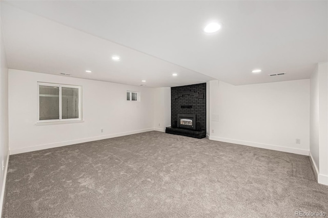 5401 E Dakota Ave Unit 22, Denver, CO 80246 - unfurnished living room featuring a fireplace, carpet, and recessed lighting