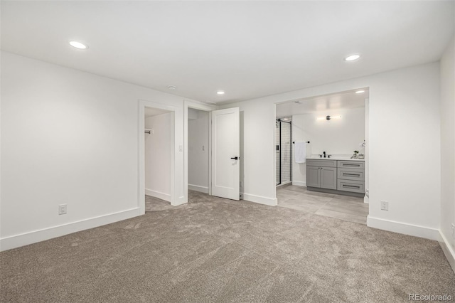 5401 E Dakota Ave Unit 22, Denver, CO 80246 - empty room with light carpet and recessed lighting