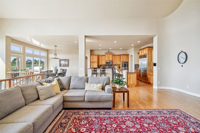 living room featuring light wood-type flooring