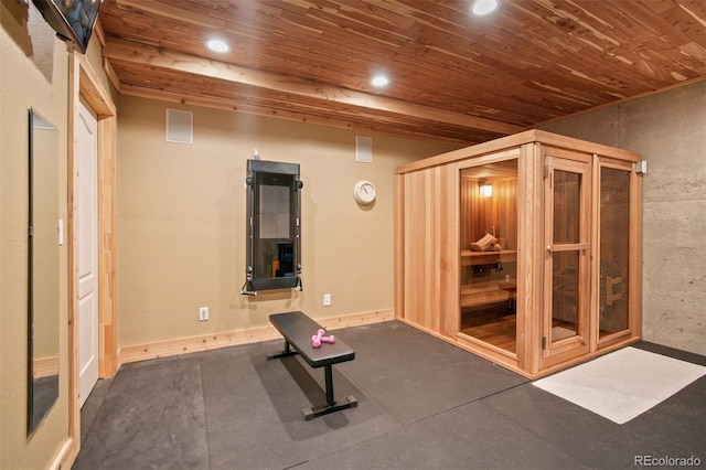 exercise room with wooden ceiling