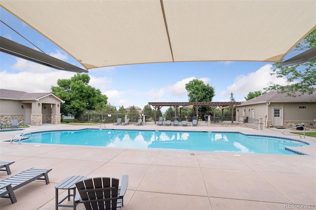 view of swimming pool with a pergola and a patio