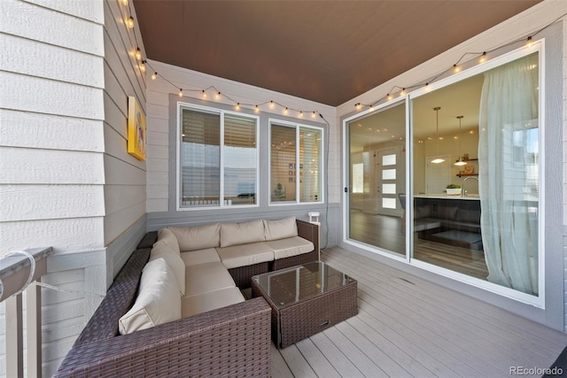 deck with an outdoor hangout area