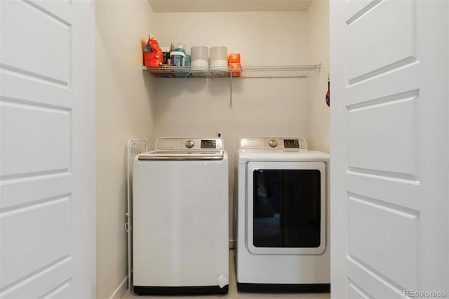 laundry room featuring laundry area and washer and clothes dryer