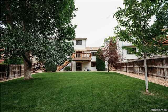 17530 E Caspian Pl, Aurora, CO 80013 - rear view of house with stairs, a fenced backyard, and a wooden deck