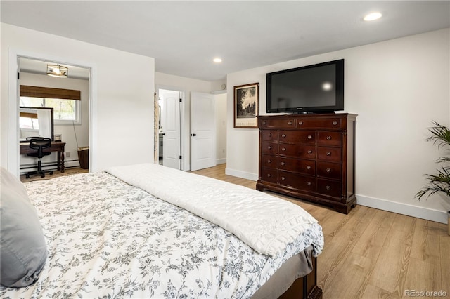 bedroom featuring recessed lighting, baseboards, and light wood-style flooring