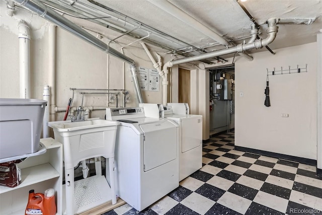 washroom featuring washer and clothes dryer