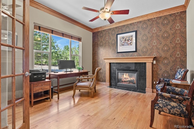 11268 Bell Cross Cir, Parker, CO 80138 - office area with ornamental molding, a ceiling fan, wood finished floors, and a fireplace