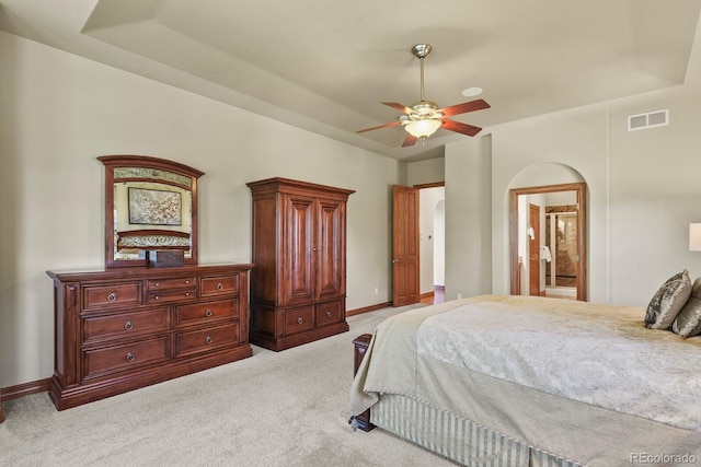 11268 Bell Cross Cir, Parker, CO 80138 - bedroom featuring light colored carpet, arched walkways, and a ceiling fan