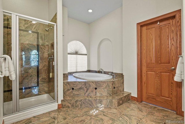 11268 Bell Cross Cir, Parker, CO 80138 - bathroom featuring a bath, a shower stall, marble finish floors, and recessed lighting
