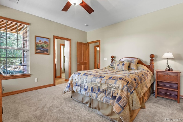 11268 Bell Cross Cir, Parker, CO 80138 - carpeted bedroom with ceiling fan and ensuite bath
