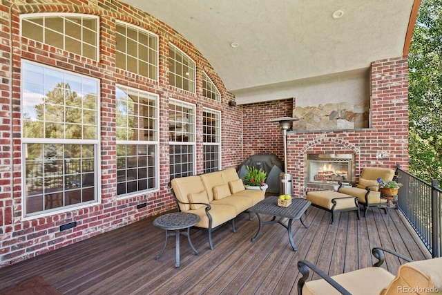 11268 Bell Cross Cir, Parker, CO 80138 - wooden terrace with an outdoor living space with a fireplace and a grill