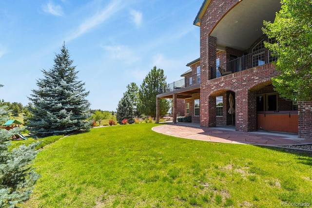 11268 Bell Cross Cir, Parker, CO 80138 - view of green lawn with a patio area