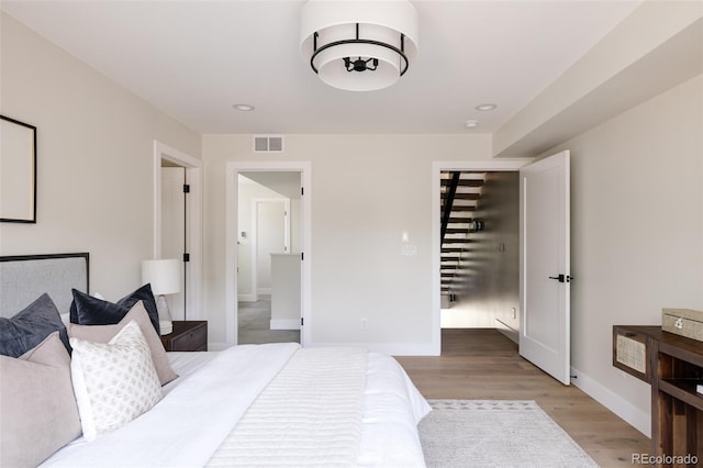 bedroom with light hardwood / wood-style flooring