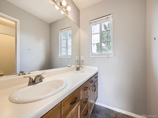 5154 E 126th Ct, Thornton, CO 80241 - full bathroom featuring double vanity and baseboards