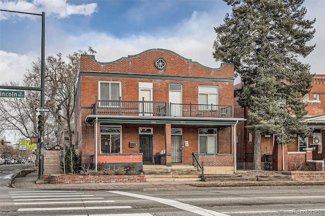 multi unit property featuring brick siding
