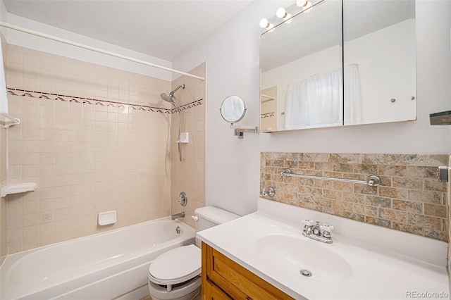 10858 Norton Ave, Conifer, CO 80433 - bathroom with toilet, vanity, and shower / bathing tub combination