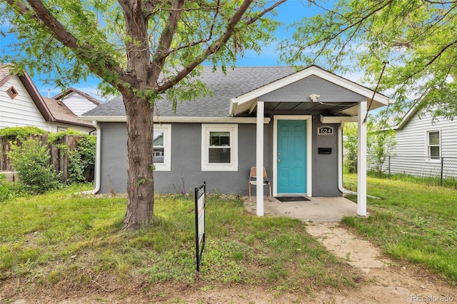 524 N 4th Ave, Sterling, CO 80751 - view of front of property with roof with shingles and stucco siding