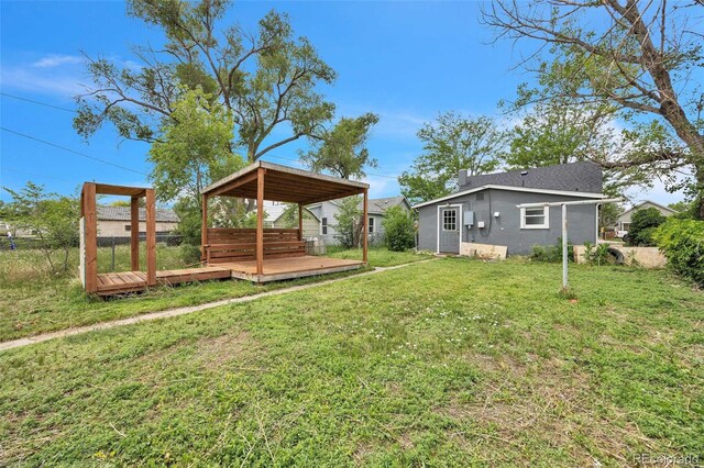 524 N 4th Ave, Sterling, CO 80751 - view of yard with a wooden deck