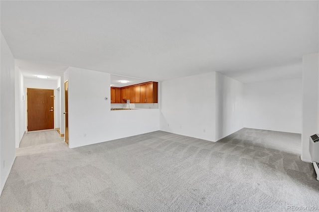 3022 S Wheeling Way Unit 205, Aurora, CO 80014 - unfurnished living room with light carpet