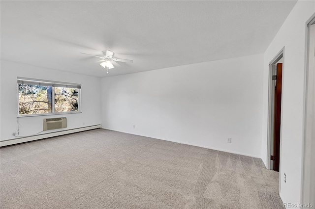 3022 S Wheeling Way Unit 205, Aurora, CO 80014 - unfurnished room with ceiling fan, carpet, a wall mounted air conditioner, and baseboard heating
