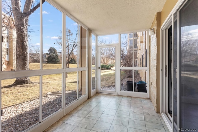 unfurnished sunroom with plenty of natural light