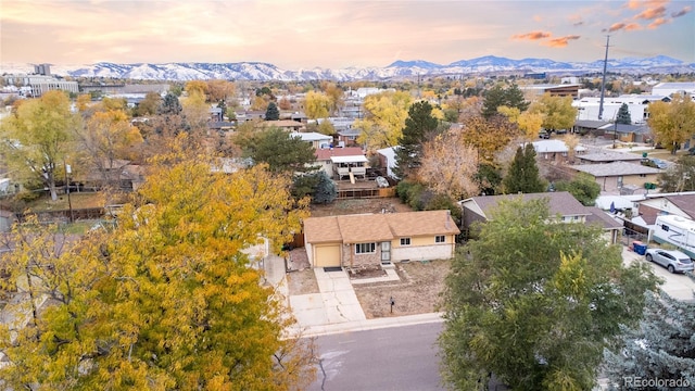 aerial view at dusk with a mountain view