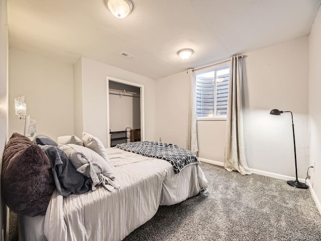 bedroom with carpet, visible vents, and baseboards