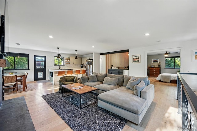 1801 Redwood Ave, Boulder, CO 80304 - living area featuring light wood-style floors, recessed lighting, ceiling fan, and healthy amount of natural light