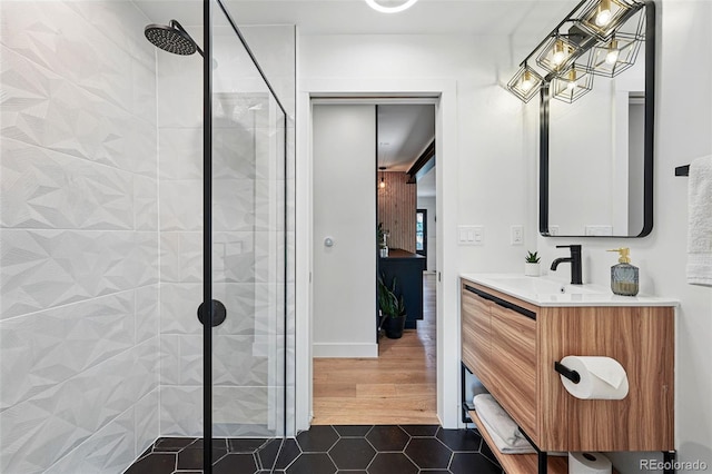 1801 Redwood Ave, Boulder, CO 80304 - bathroom featuring a tile shower, vanity, and tile patterned floors