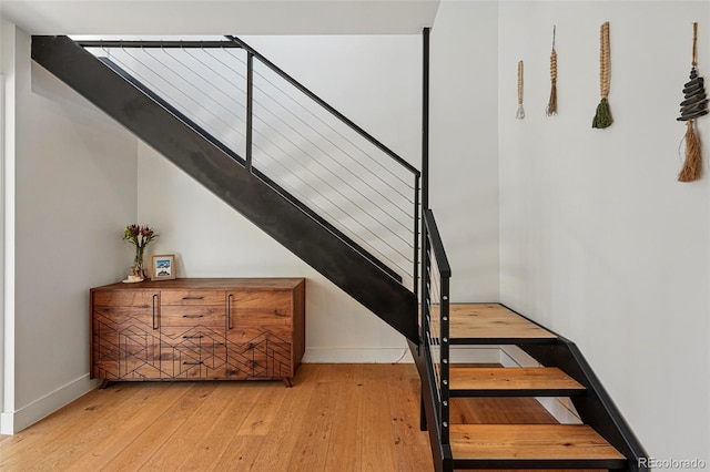 1801 Redwood Ave, Boulder, CO 80304 - stairway featuring wood-type flooring and baseboards