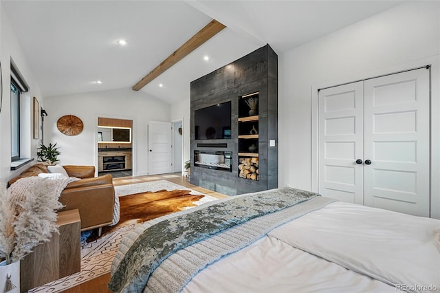 1801 Redwood Ave, Boulder, CO 80304 - bedroom featuring a fireplace, wood finished floors, recessed lighting, and a closet