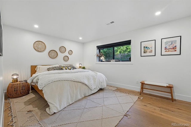 1801 Redwood Ave, Boulder, CO 80304 - bedroom with wood finished floors, recessed lighting, and baseboards