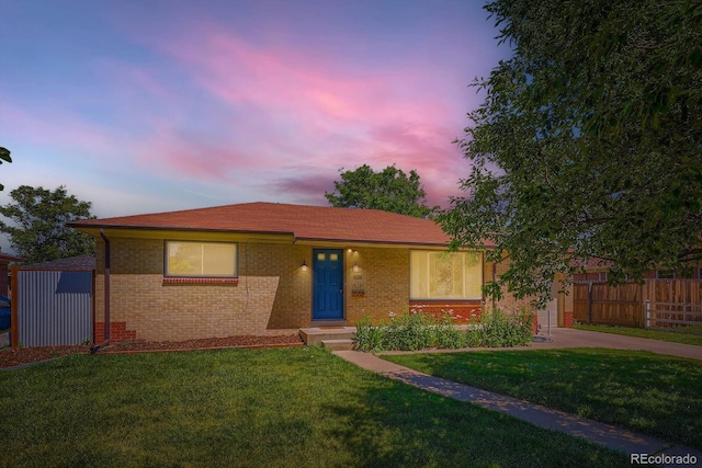 2310 Kenton St, Aurora, CO 80010 - ranch-style home with brick siding and an attached garage